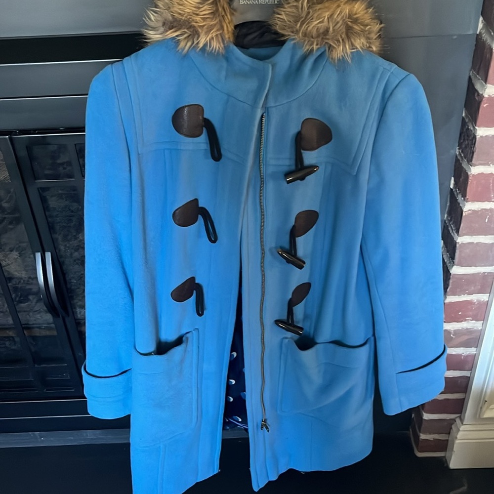 Barely worn Boden size 4 winter jacket. Pretty blue with peacoat style